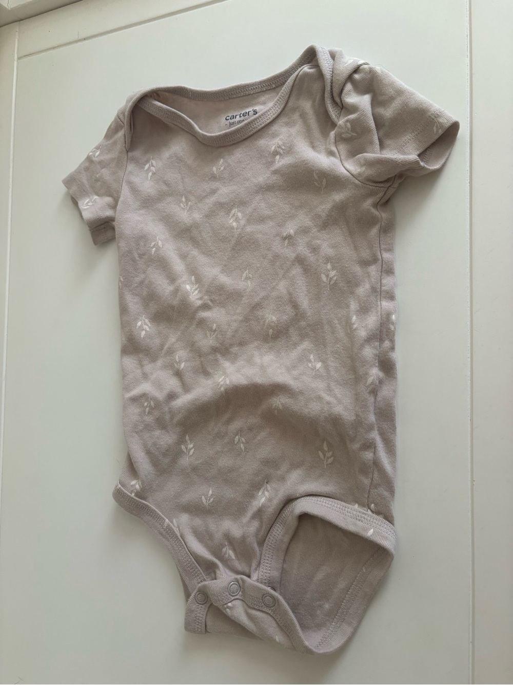 Carter's Light Tan Short-Sleeve Baby One-Piece with Subtle Leaf Design